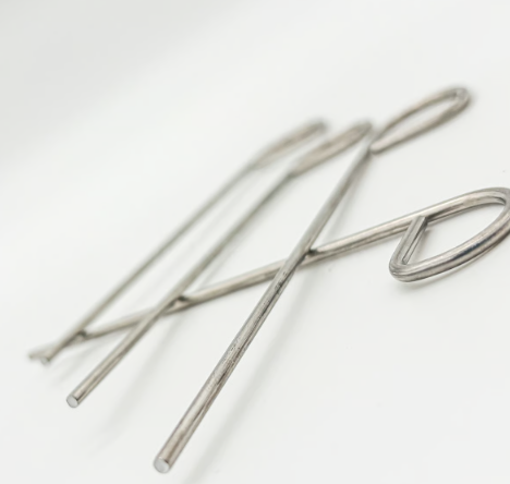Pusher, metal handled