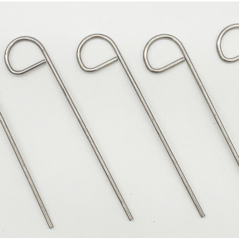 Pusher, metal handled