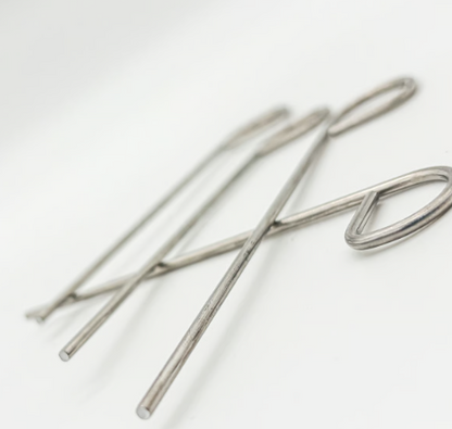 Pusher, metal handled